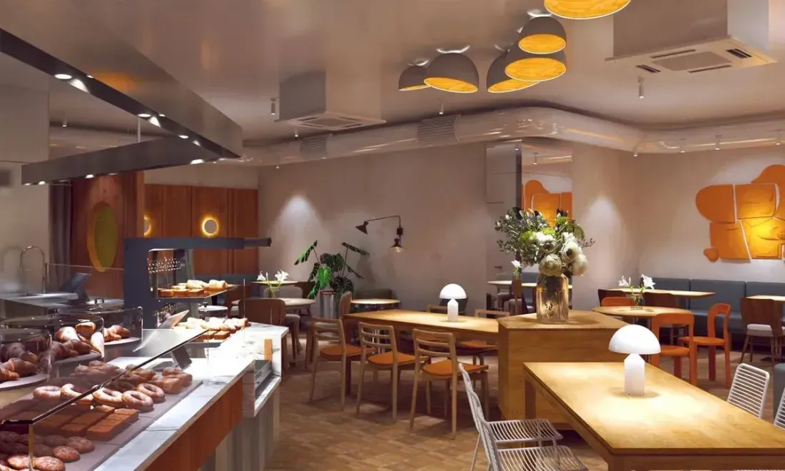 Interieur des Cafés Scramble mit großen Fenstern und heller Einrichtung